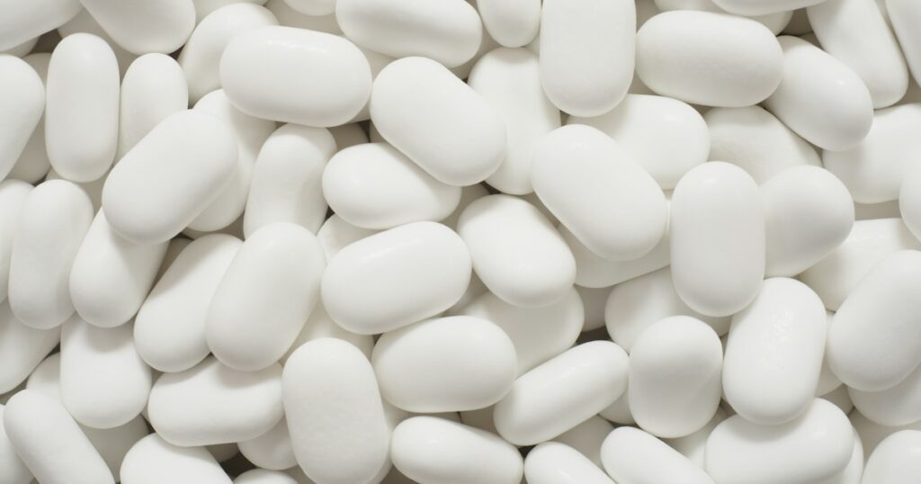 Close-up of white oval tablets