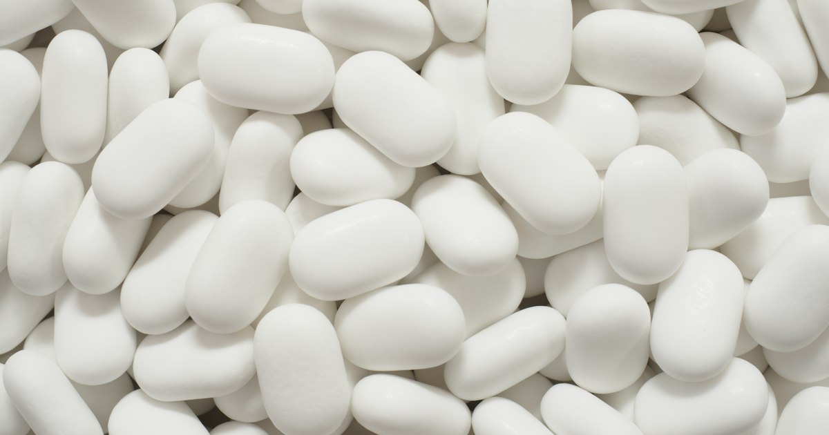 Close-up of white oval tablets