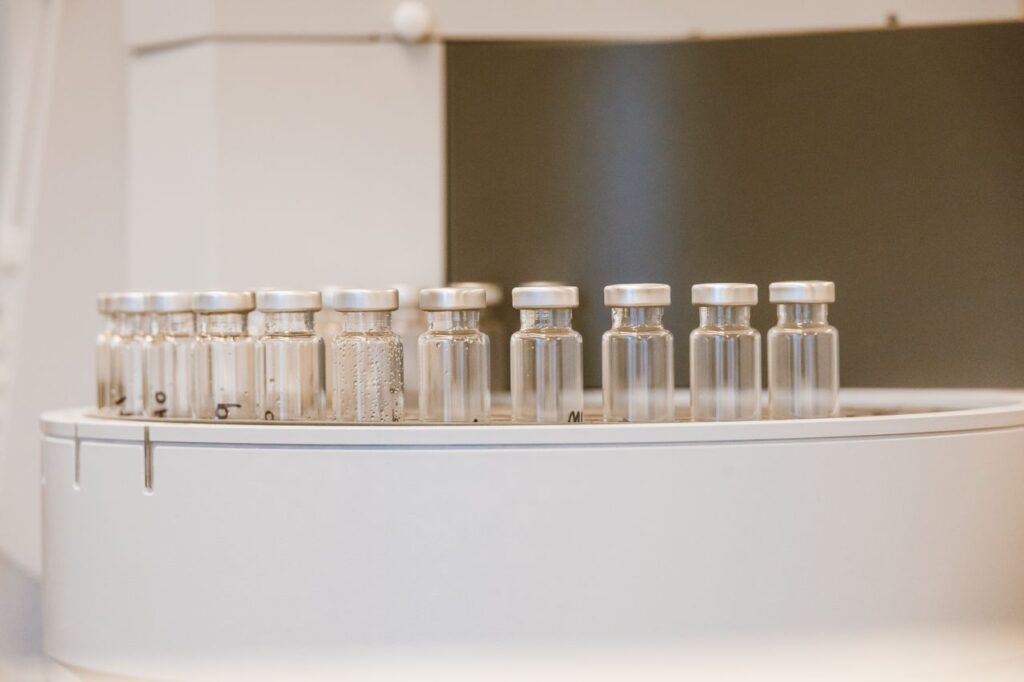 Empty glass vials arranged in a laboratory
