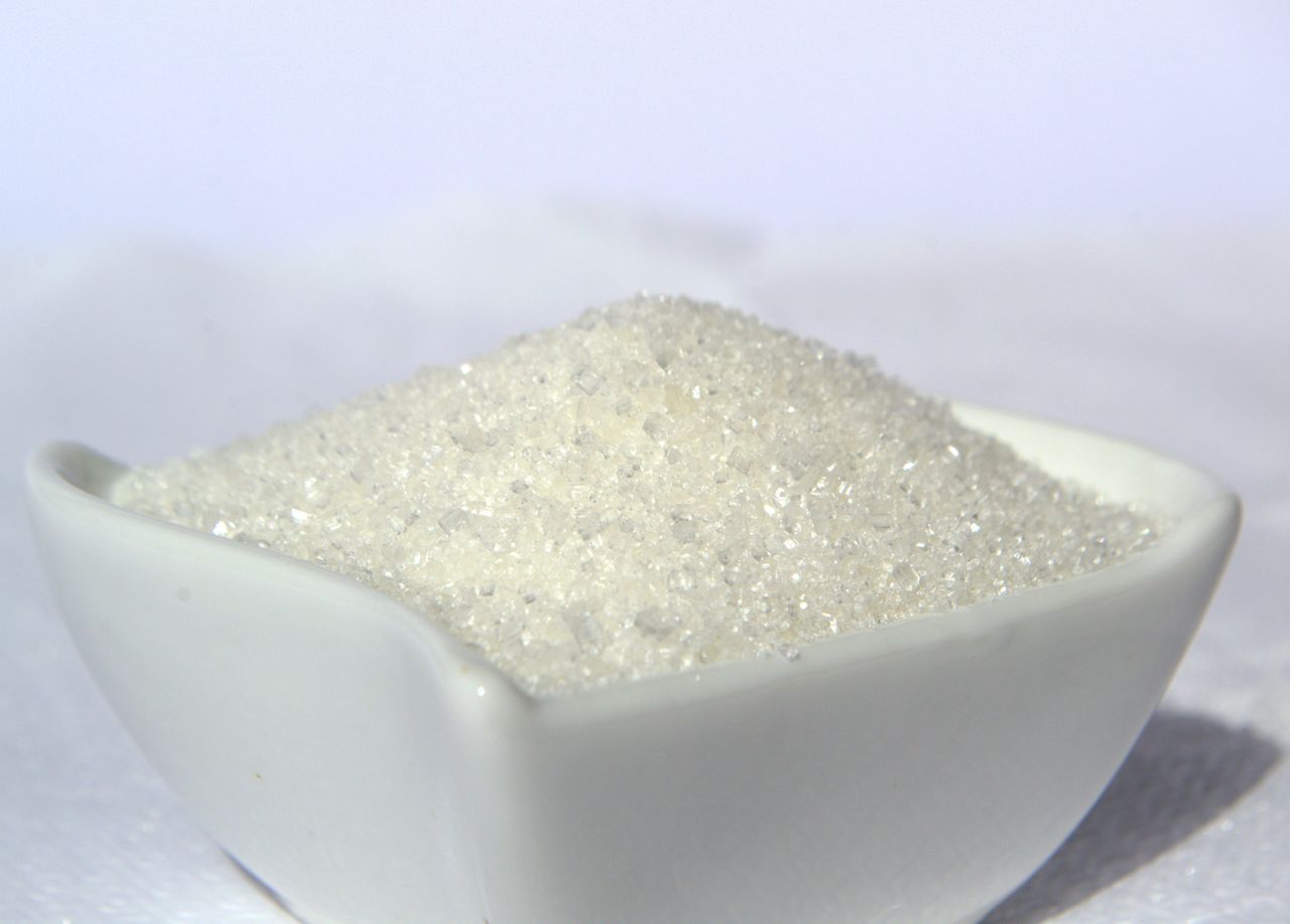 Coarse white crystals in a bowl