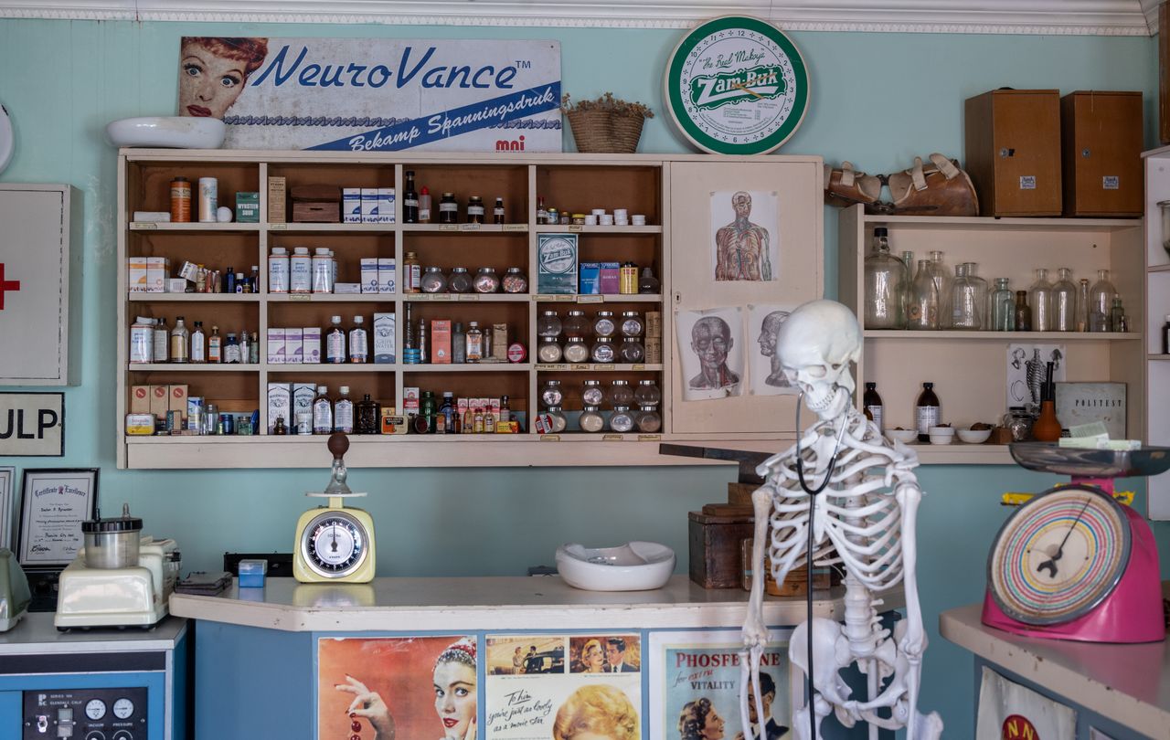 Inside an old-fashioned pharmacy with vintage medicine bottles