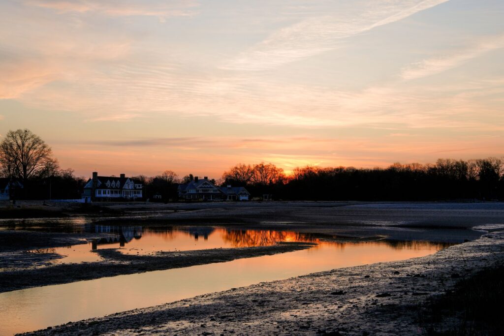 A tranquil sunrise over Cove Island Park in Stamford, Connecticut, reflecting on