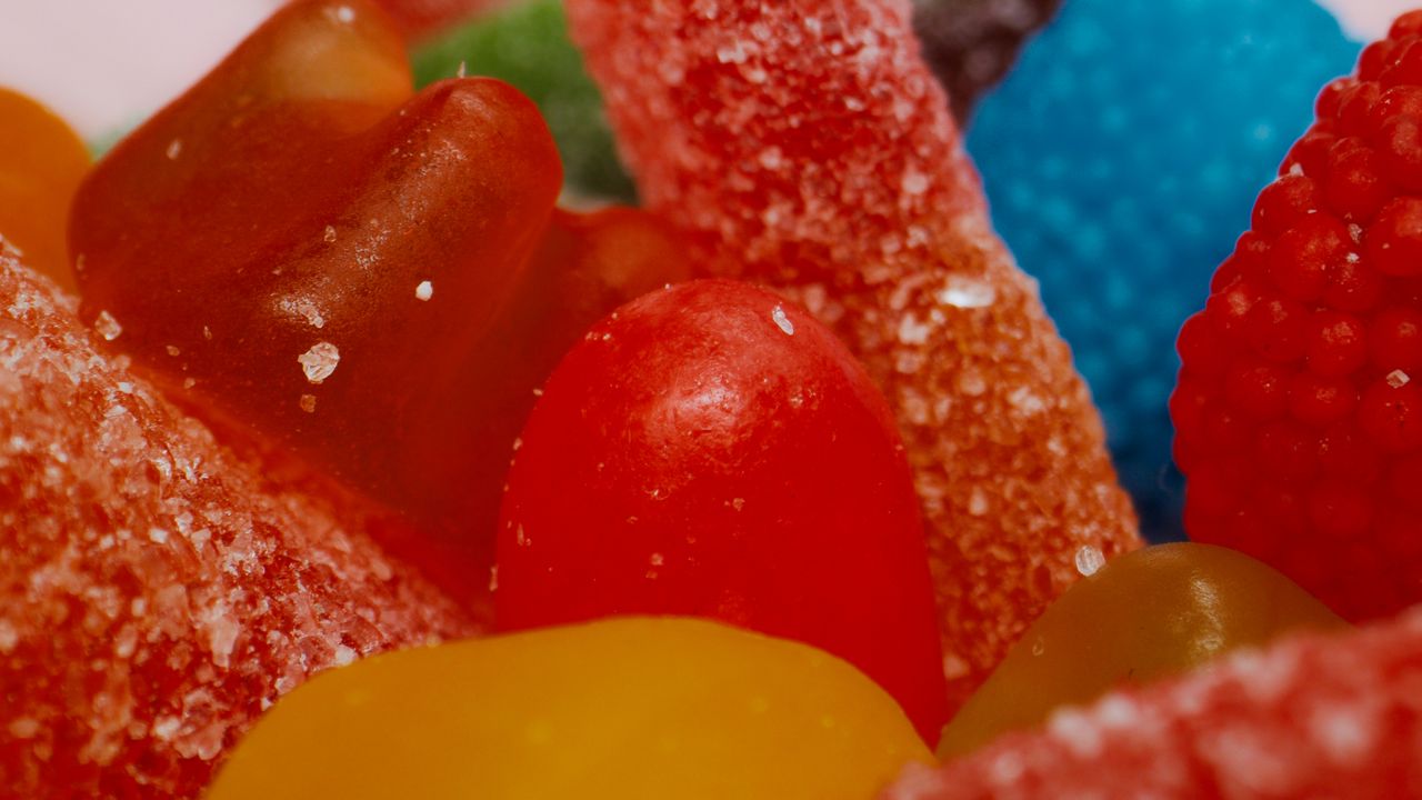 Assorted sugary gummy candies up close