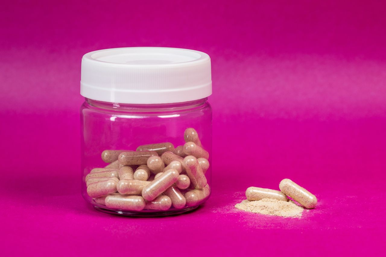 Glass jar filled with capsules