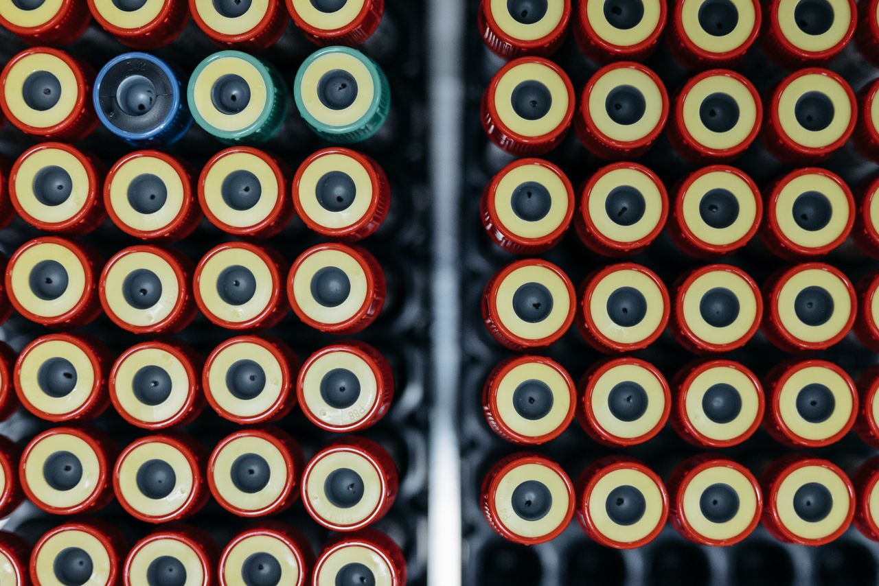 Capped laboratory test tubes in a clinical setting