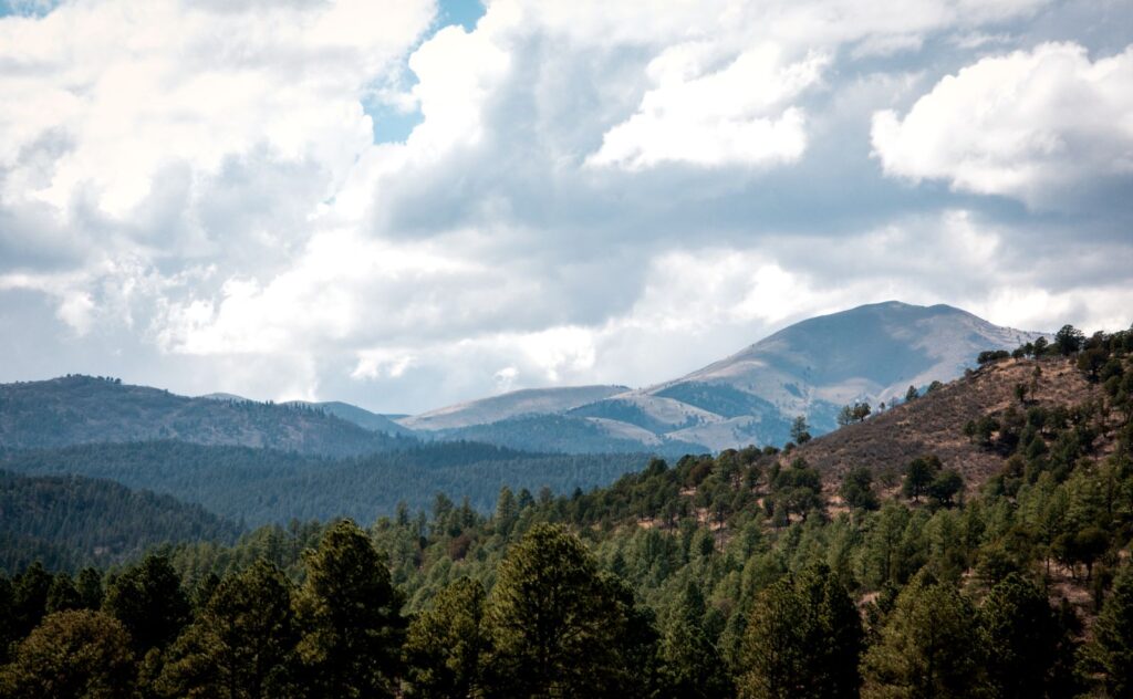 Beautiful mountainous landscape in Ruidoso, NM with lush forest and dramatic
