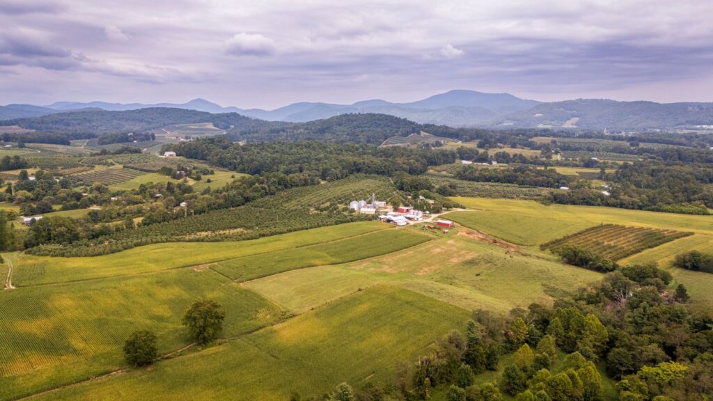 Stunning aerial view of the picturesque green landscape and rolling hills in North