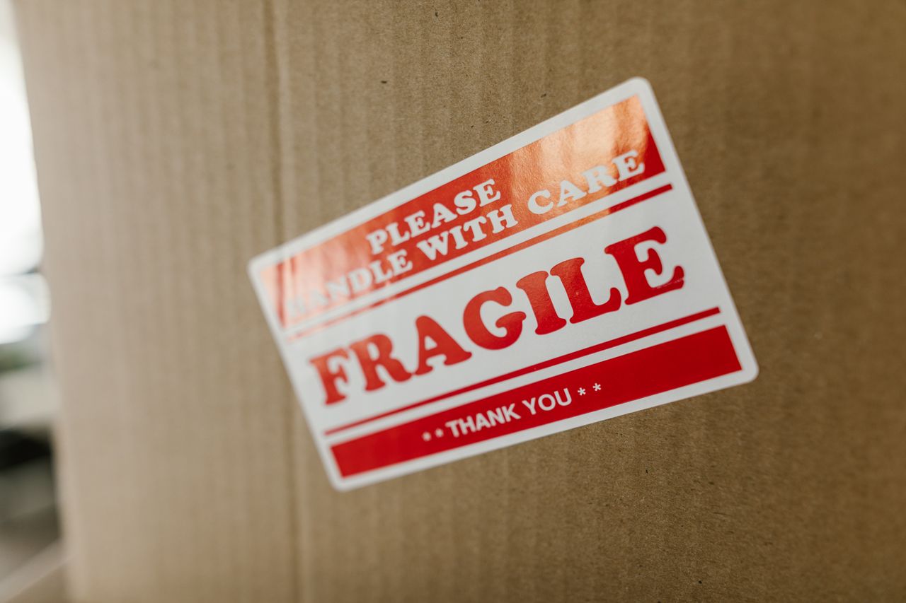 Cardboard box with a fragile sticker