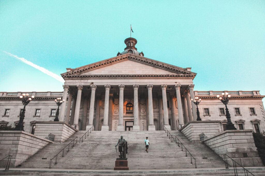 Striking view of the South Carolina State House with its grand steps and clear blue