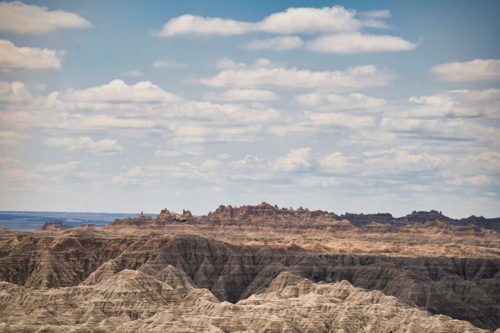 Dramatic landscape of Badlands National Park under a cloudy sky