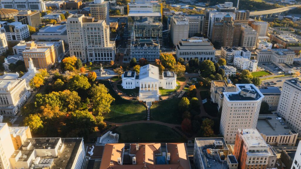 Stunning aerial view of the Virginia State Capitol surrounded by vibrant autumn