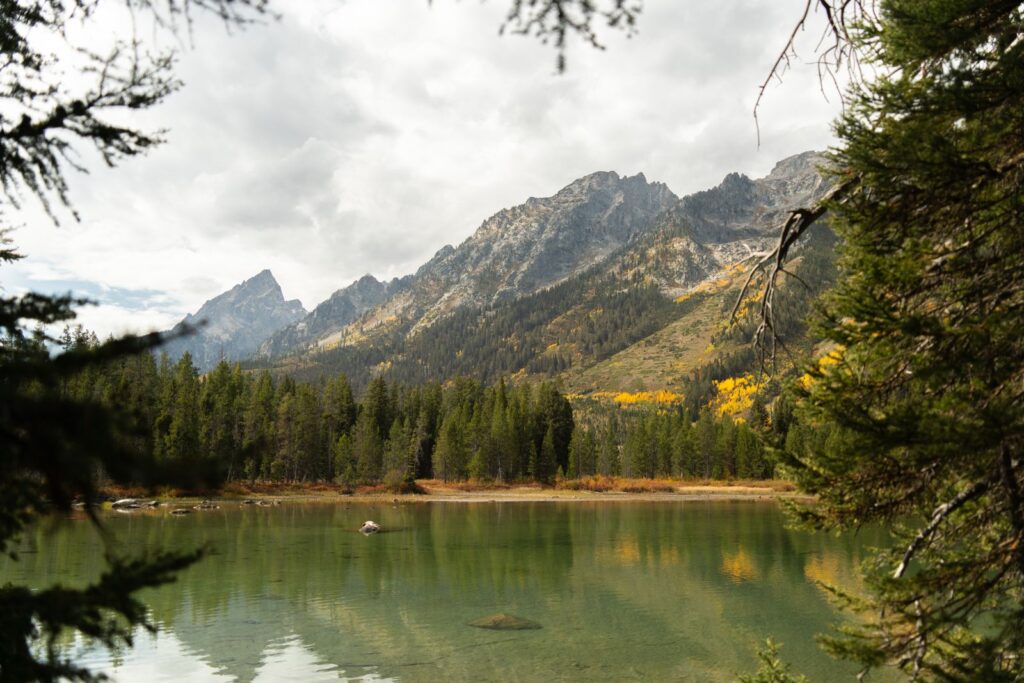 Serene autumn landscape of Grand Teton National Park with lake and mountains